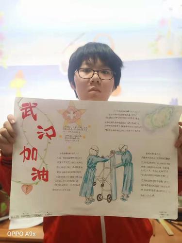 王贝宁同学创作了《武汉加油》的手抄报